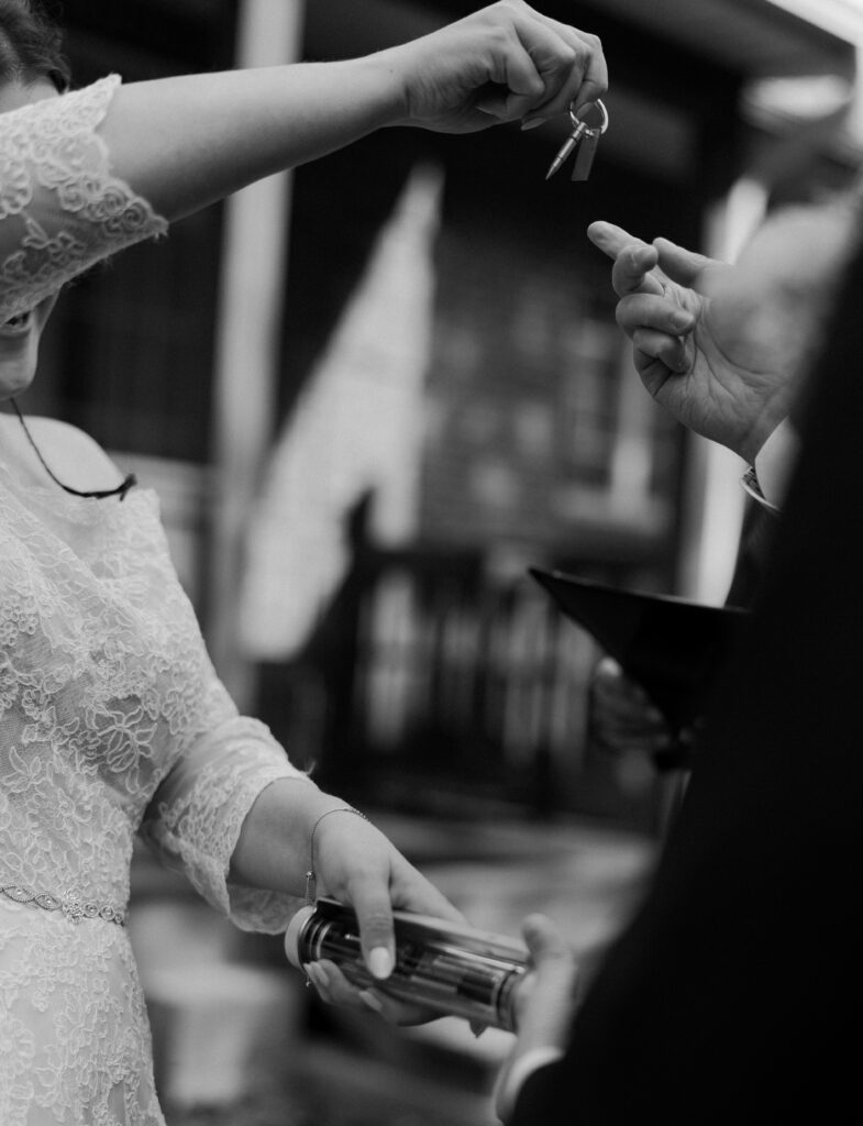 A unique ceremony idea during a wedding day in the mountains of North Carolina, they are using a time since launch capsule where they pull the lever and it starts a timer of their married life.