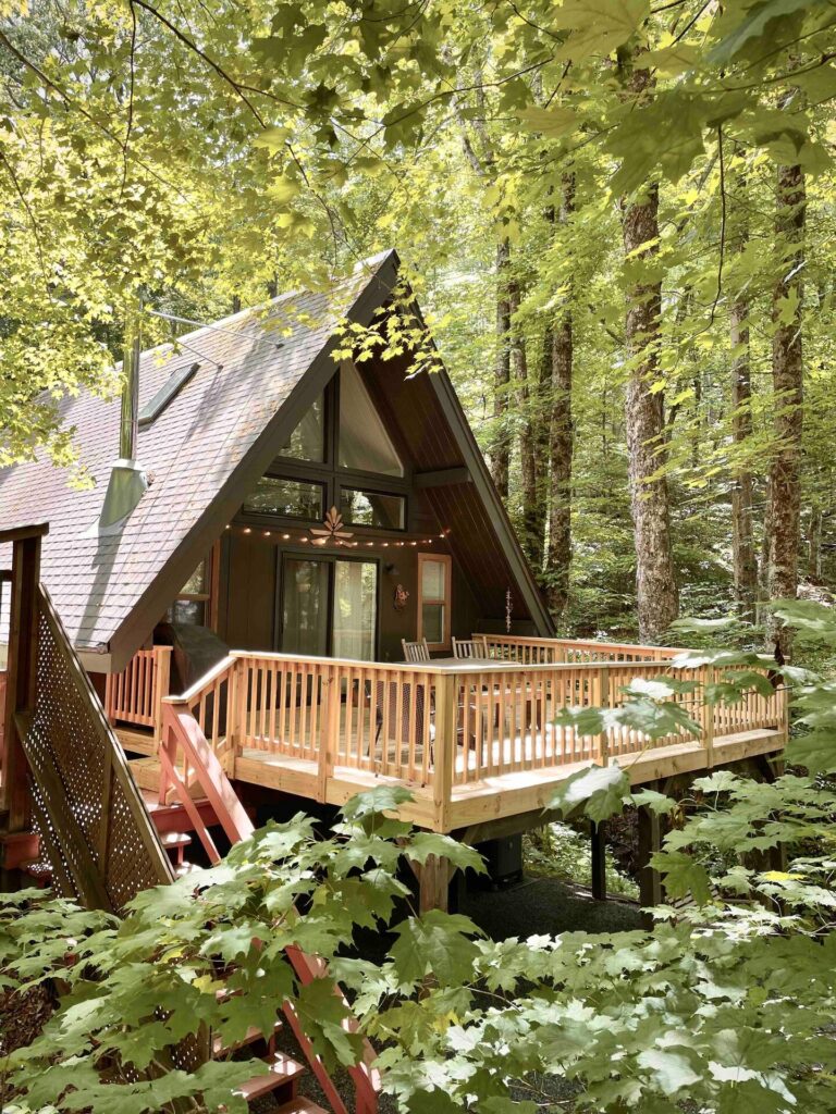 Whimsical storybook A-frame cabin in the NC mountains, a dreamy Airbnb for couples planning a small wedding or elopement.